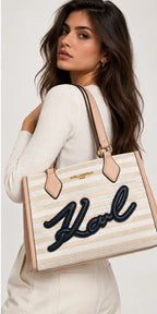 Karl Lagerfeld Paris pink and white tote bag worn by model